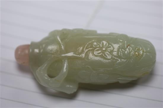 A Chinese white jade snuff bottle, 19th century, H. 7cm excluding stopper